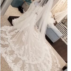 Kitty Chen wedding dress and cathedral veil.